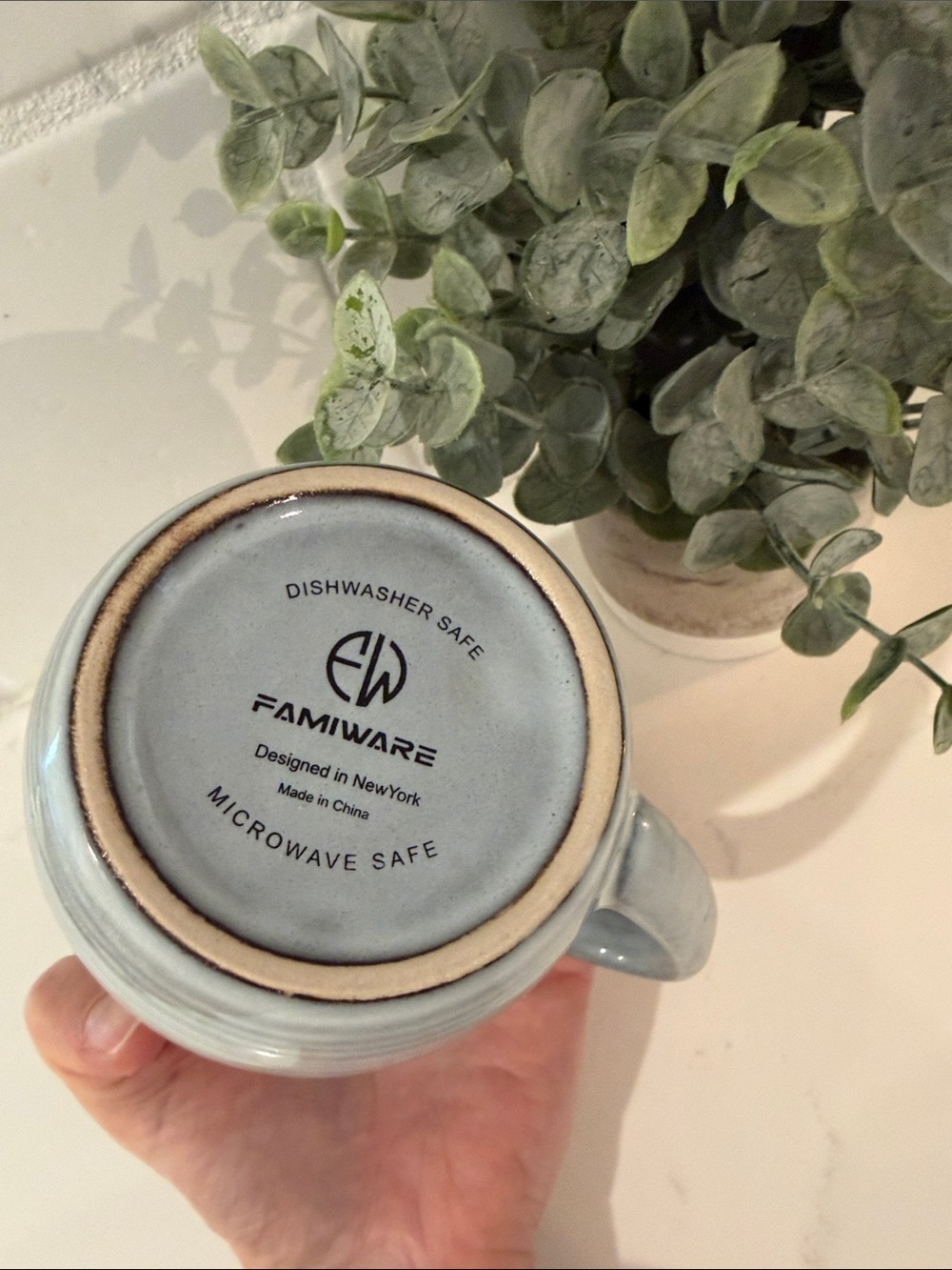 Handcrafted Light Blue Ceramic Mug with Subtle Ribbing - Picture 2 of 3